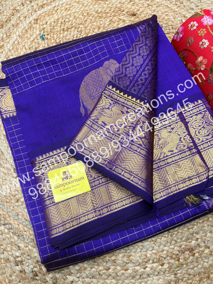 Violet Elegant Elephant zari buttu in the borders , zari checks in the body and rich Pallu Silk Cotton Saree