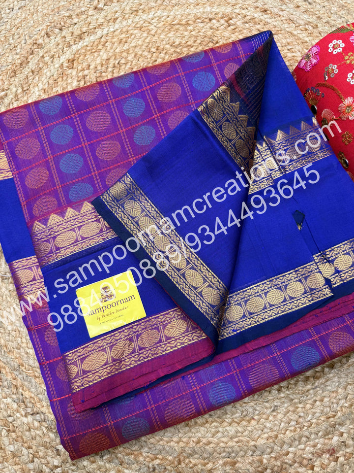 Purple with Blue , rich Rudraksh Thread butta in the body  , rettapet borders and rich Pallu silk cotton saree