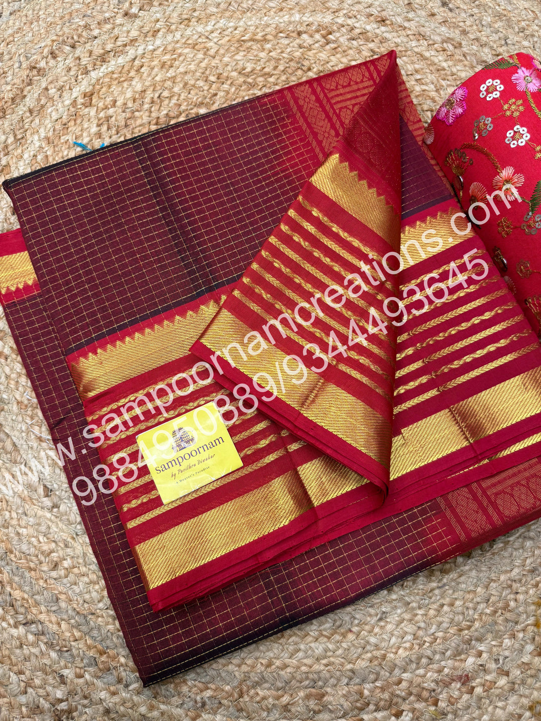 Maroon with Red , rich Zari checks in the body and traditional Veldhari  border , rich Pallu Silk Cotton Saree
