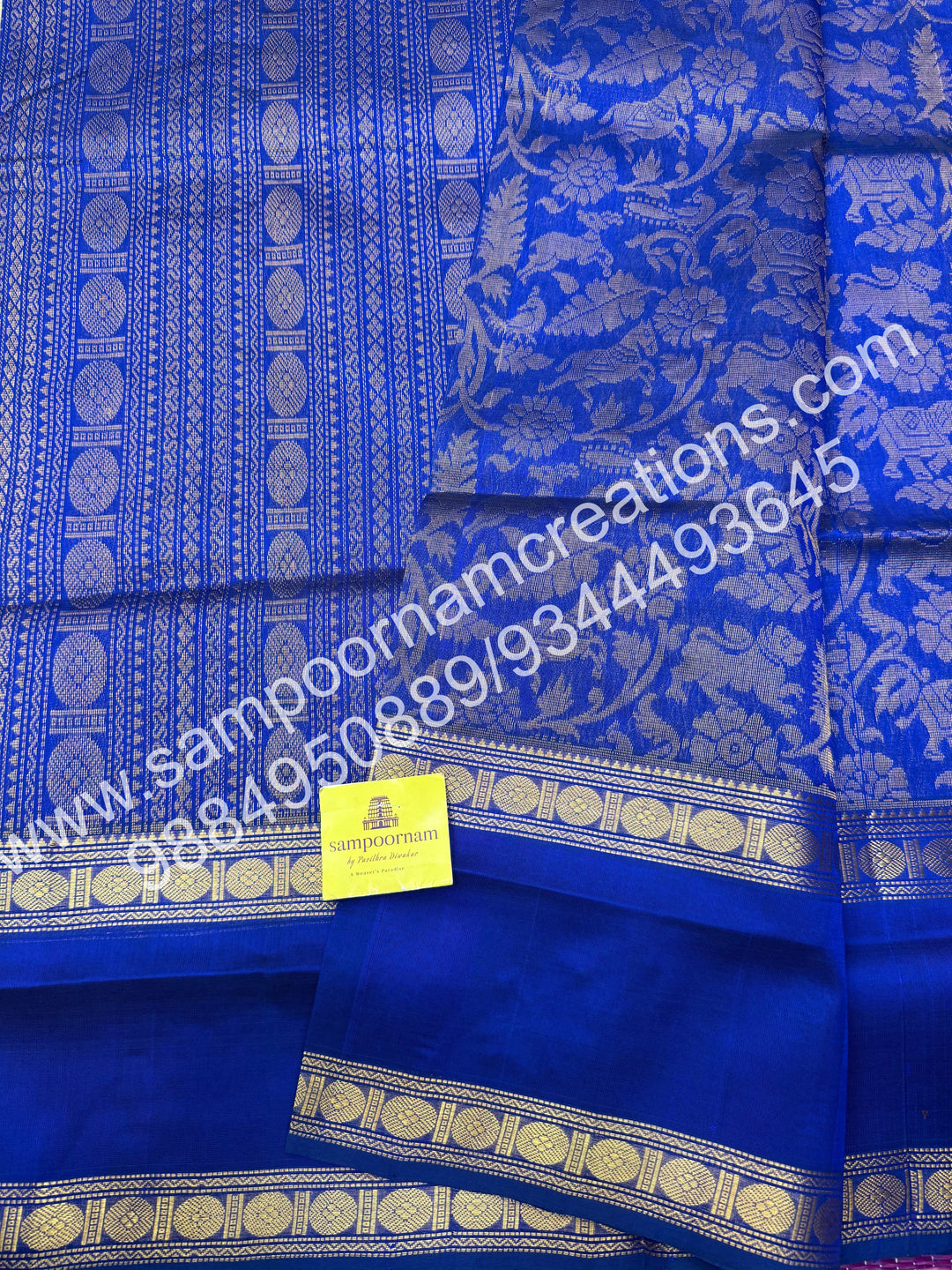 Royal blue ,  rich Vanasingaram Designs in the body , rettapet borders and rich pallu silk cotton saree