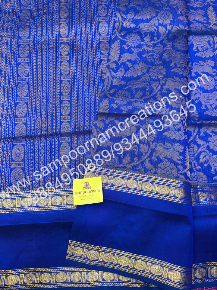 Royal blue ,  rich Vanasingaram Designs in the body , rettapet borders and rich pallu silk cotton saree