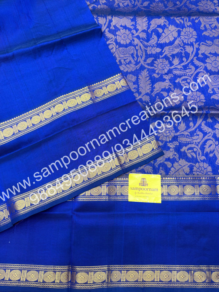 Royal blue ,  rich Vanasingaram Designs in the body , rettapet borders and rich pallu silk cotton saree