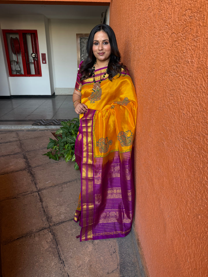 Mambazha Manjal with Purple, traditional elephant motif borders and rich Pallu, annam hand block prints in the body , korvai silk cotton saree