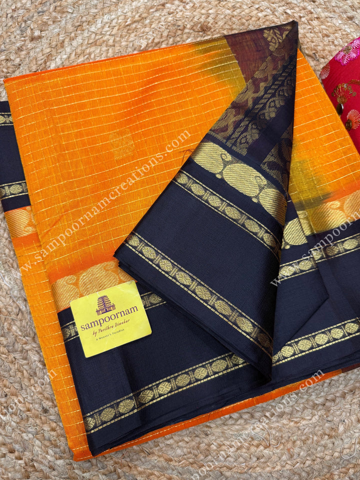 Mambazha Manjal with Deep Brown , Zari checks and Annam butta in the body  ,  Rettapetborders and rich Pallu Korvai Silk Cotton Sareee