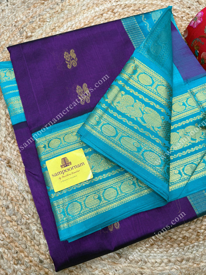 Vadamalli with Turquoise Blue , Rich Zari butta in the body and Traditional Kanchi borders , rich Pallu Korvai Silk Cotton Sareee
