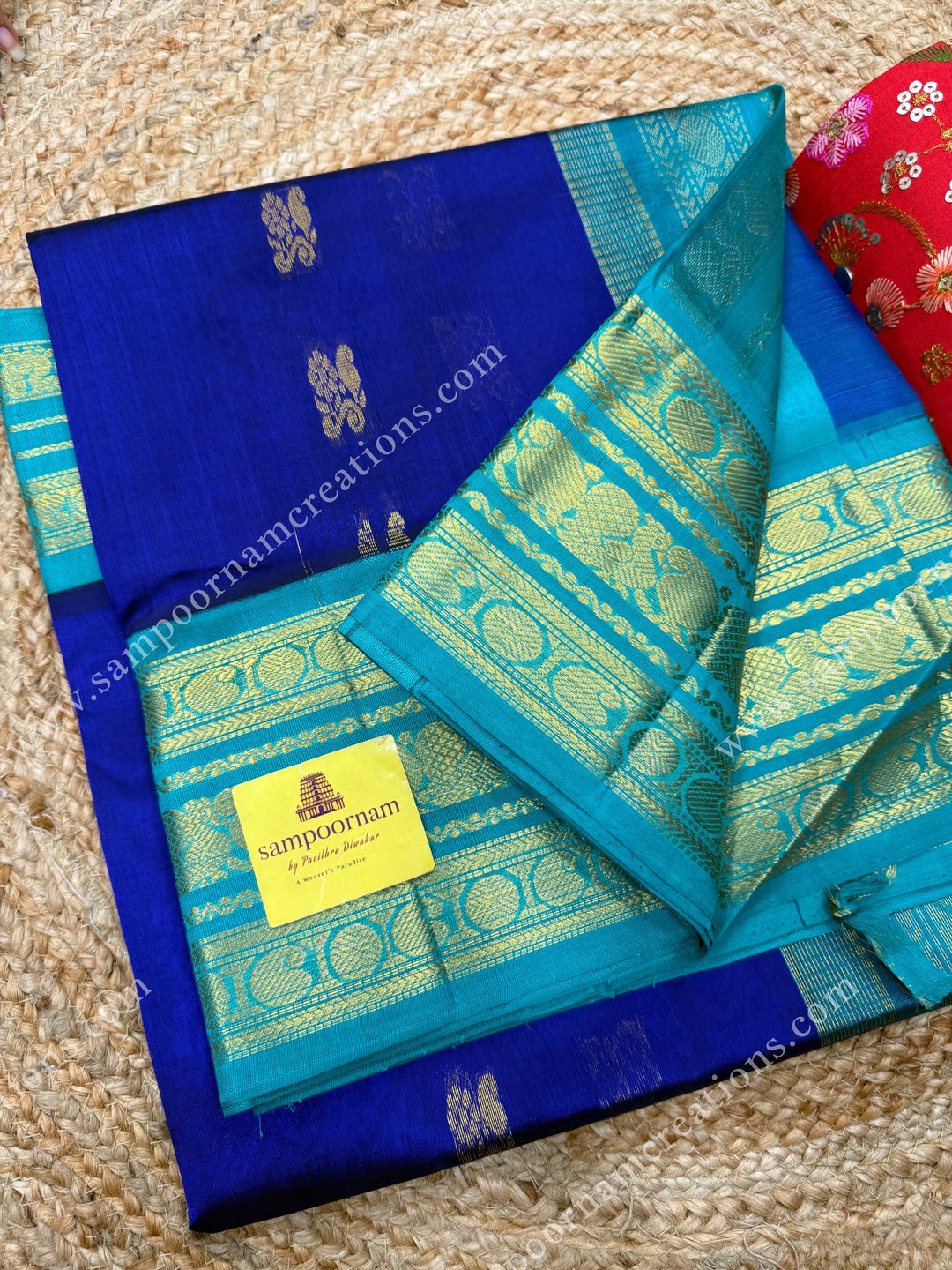 Indigo Blue with Light Blue  , Rich Zari butta in the body and Traditional Kanchi borders and  rich Pallu Korvai Silk Cotton Sareee