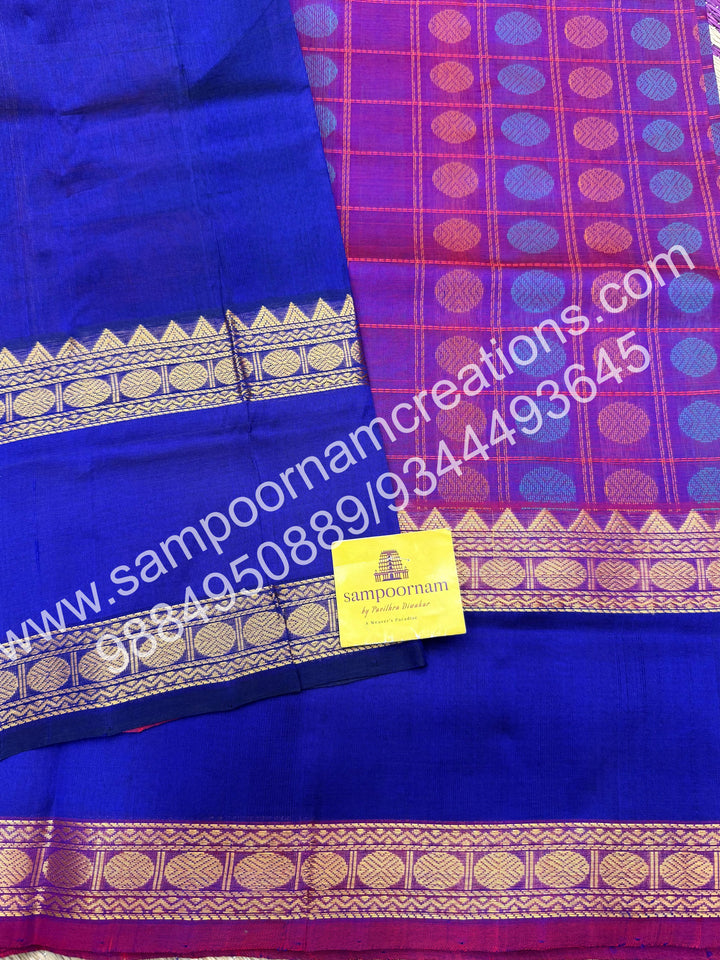 Purple with Blue , rich Rudraksh Thread butta in the body  , rettapet borders and rich Pallu silk cotton saree