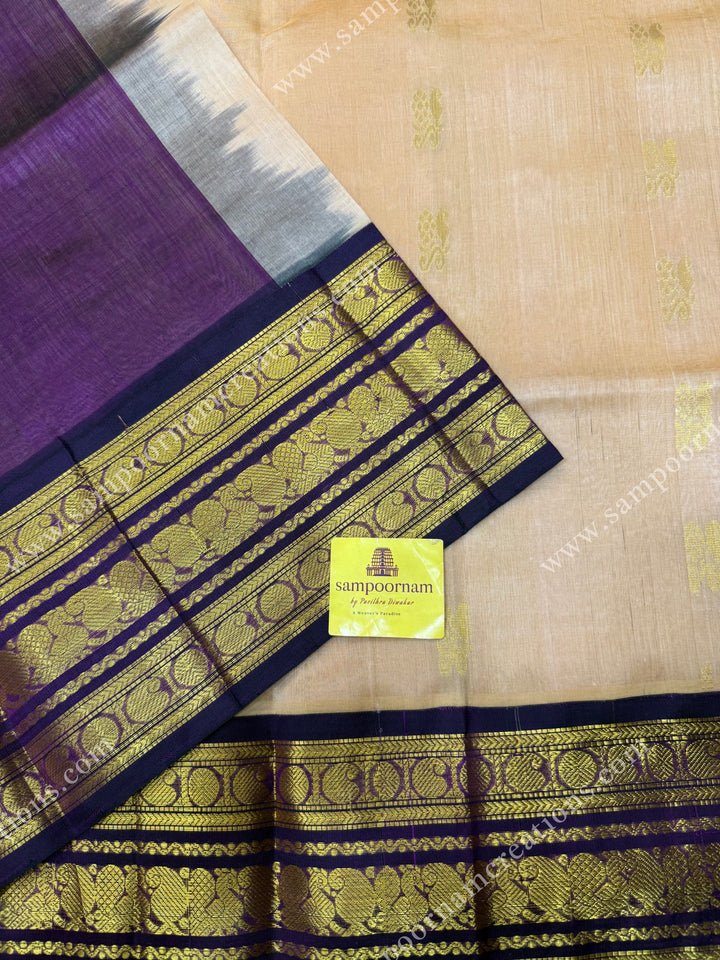Biscuit with Purple , Rich Zari butta in the body and Traditional Kanchi borders , rich Pallu Korvai Silk Cotton Sareee