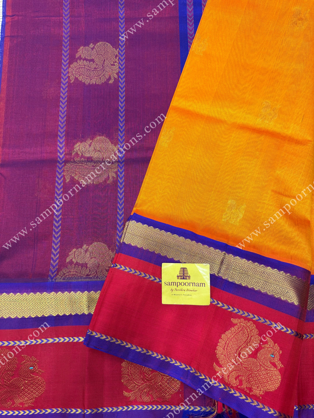 Mambazha Manjal with Royal Blue ,  Zari Butta in the body and  Traditional Annam Motifs in the border , rich Pallu Korvai Silk Cotton Sareee