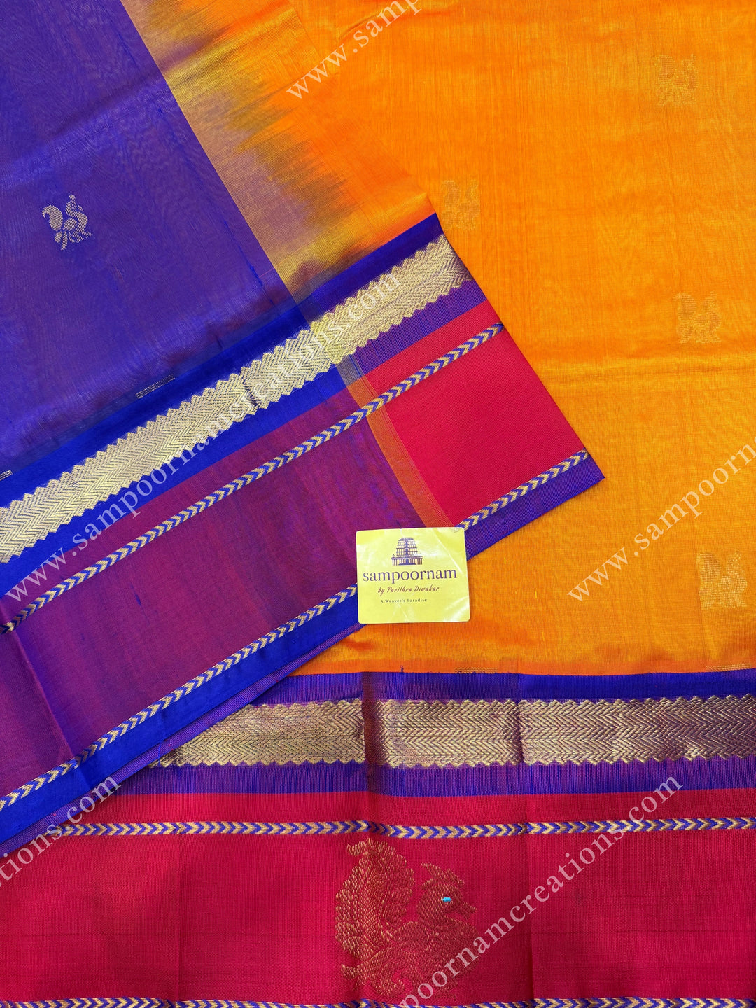 Mambazha Manjal with Royal Blue ,  Zari Butta in the body and  Traditional Annam Motifs in the border , rich Pallu Korvai Silk Cotton Sareee