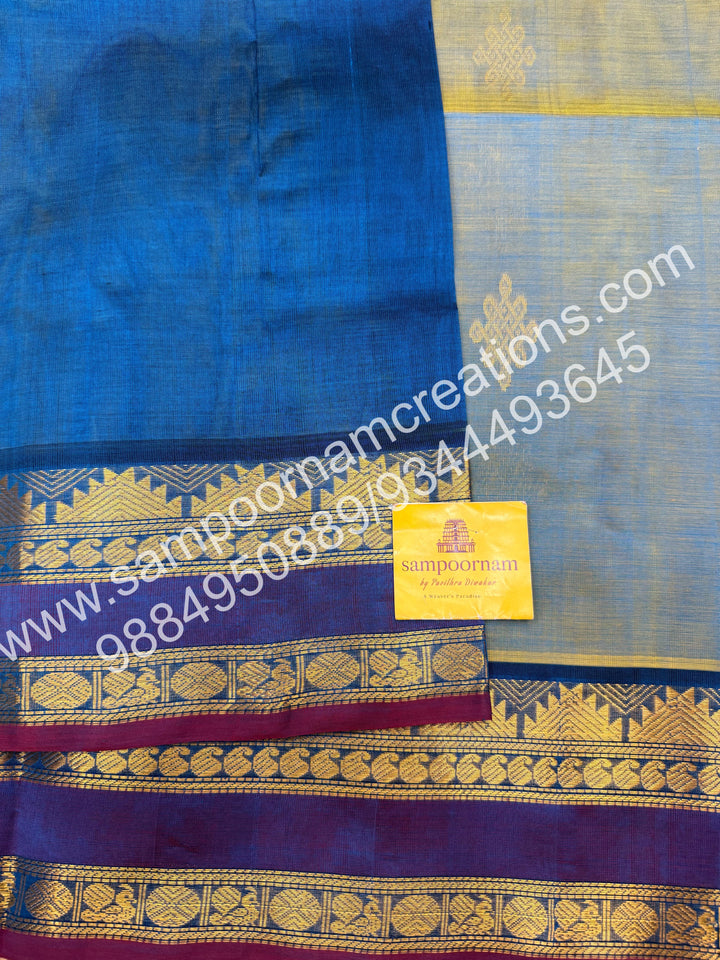 Double Shaded Ramar Green with Blue , rich Kolam Zari butta in the body , rettapet borders  and Grand Pallu Silk Cotton Saree