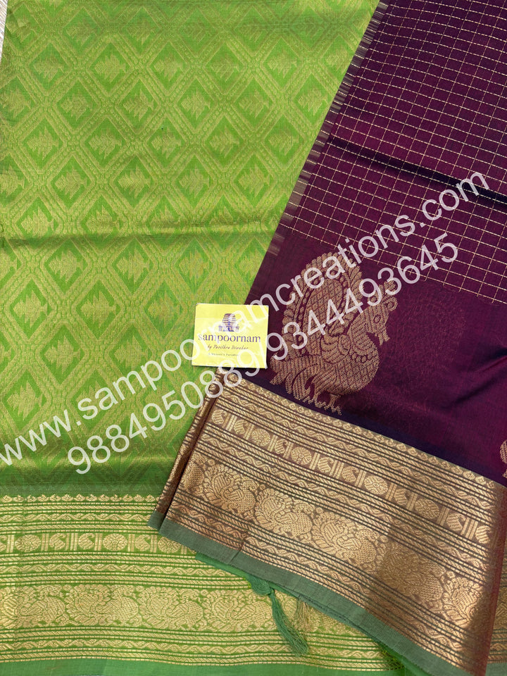 Brown with Green , Annam Motif zari buttu in the borders , zari checks in the body and rich Pallu Silk Cotton Saree