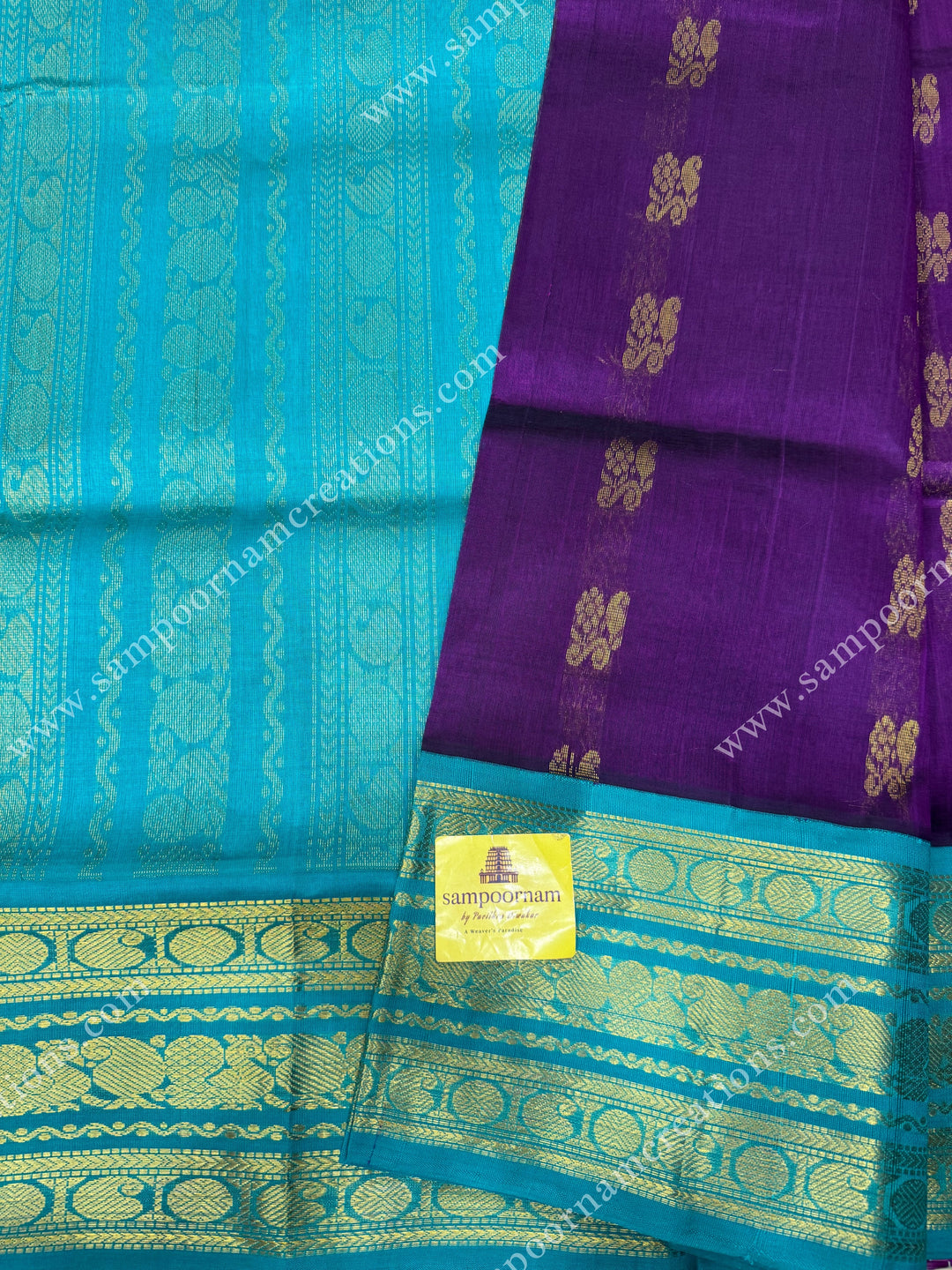 Vadamalli with Turquoise Blue , Rich Zari butta in the body and Traditional Kanchi borders , rich Pallu Korvai Silk Cotton Sareee