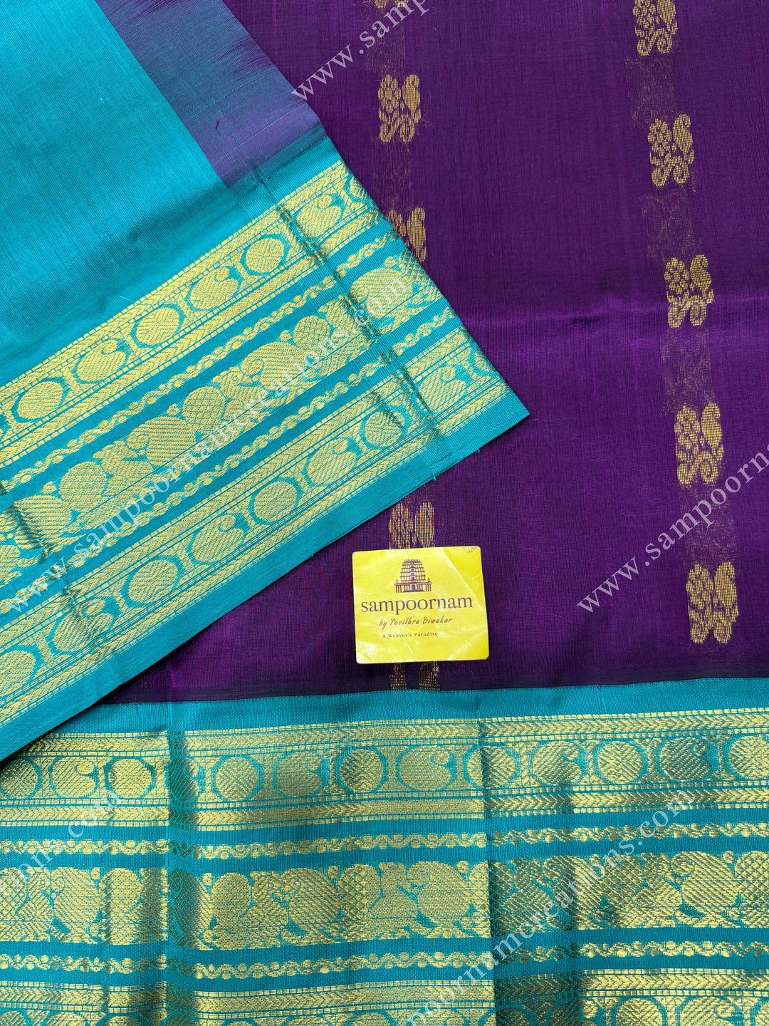 Vadamalli with Turquoise Blue , Rich Zari butta in the body and Traditional Kanchi borders , rich Pallu Korvai Silk Cotton Sareee