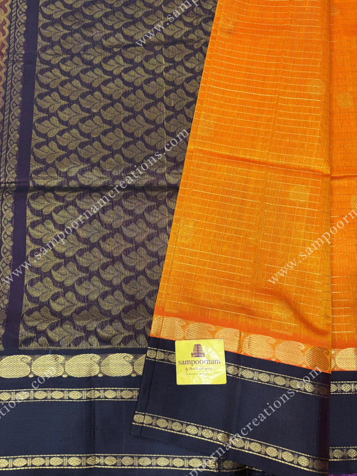 Mambazha Manjal with Deep Brown , Zari checks and Annam butta in the body  ,  Rettapetborders and rich Pallu Korvai Silk Cotton Sareee