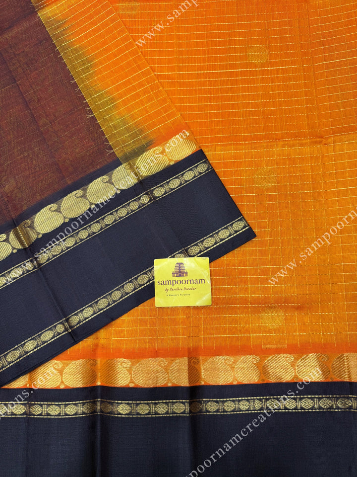 Mambazha Manjal with Deep Brown , Zari checks and Annam butta in the body  ,  Rettapetborders and rich Pallu Korvai Silk Cotton Sareee