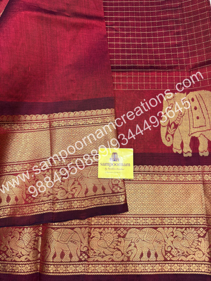 Maroon  Elegant Elephant zari buttu in the borders , zari checks in the body and rich Pallu Silk Cotton Saree