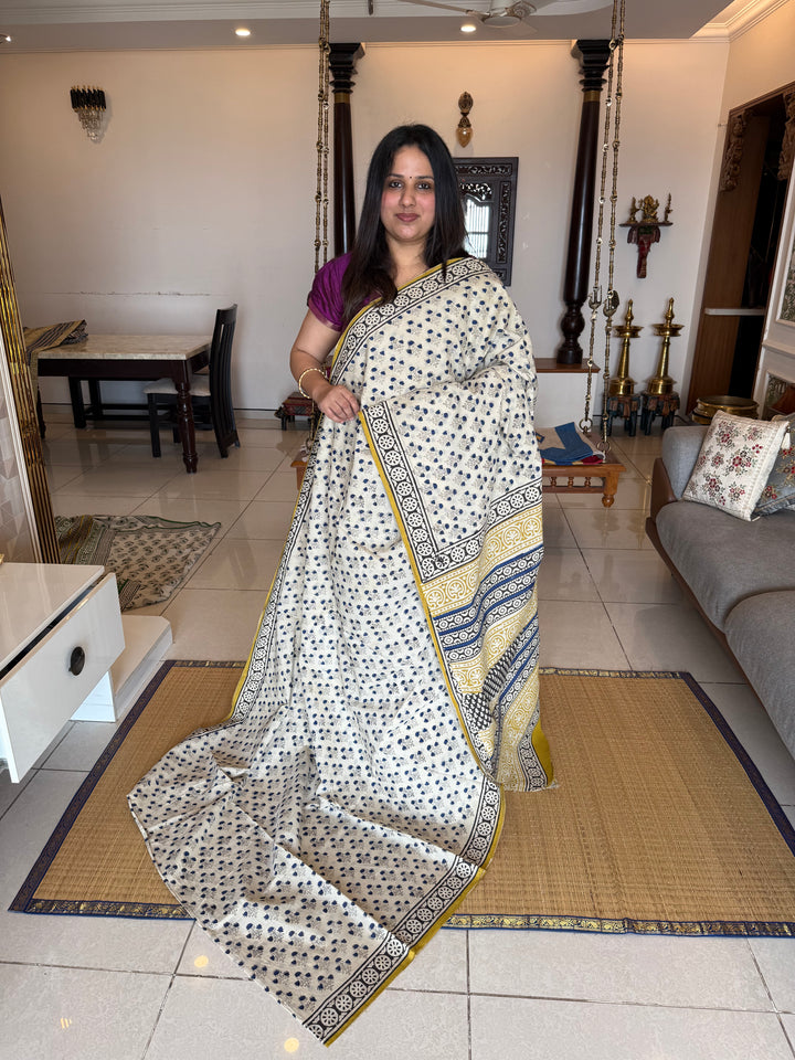 Off white with mustard , floral hand block printed mul cotton saree