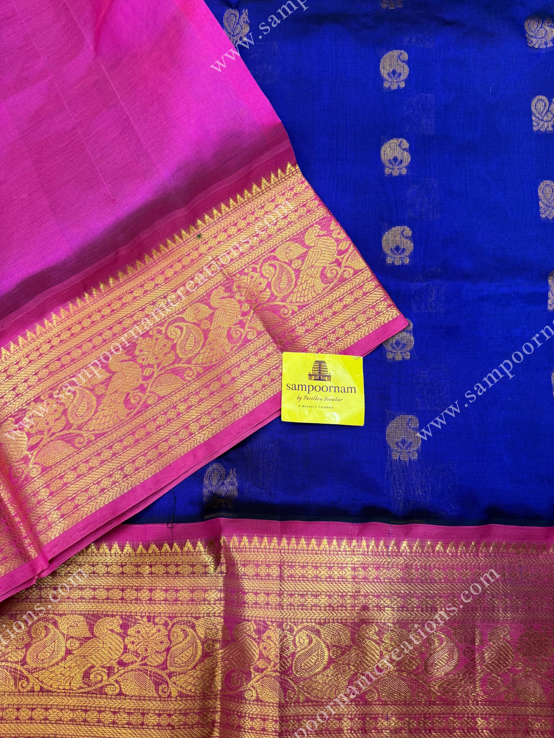 Cobalt Blue with Pink , Rich Mango and Annam  Zari butta in the body and One side long borders , rich Pallu Korvai Silk Cotton Sareee