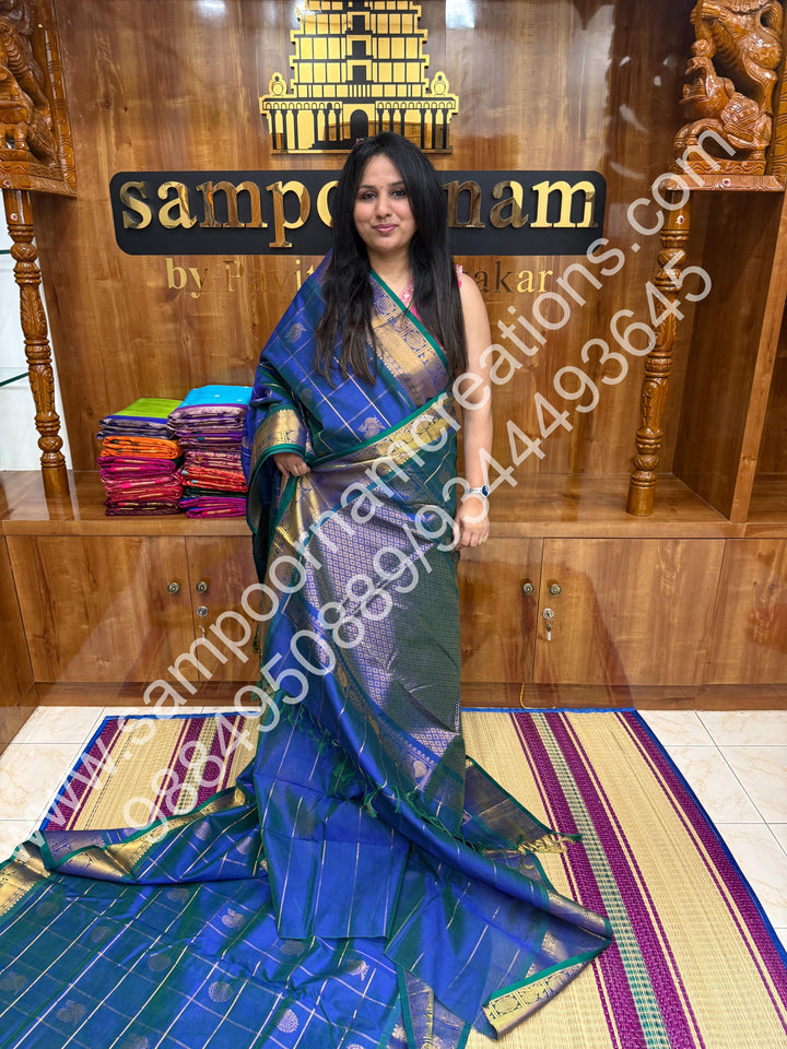 Double Shaded Mayil Kazhuthu Blue with Green  Selvedge , rich zari checks in the body , with mayil and chakram butta , Ten yards silk cotton saree