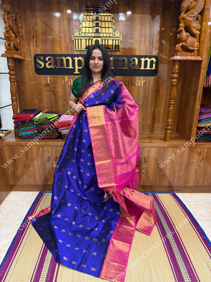 Cobalt Blue with Pink , Rich Mango and Annam  Zari butta in the body and One side long borders , rich Pallu Korvai Silk Cotton Sareee