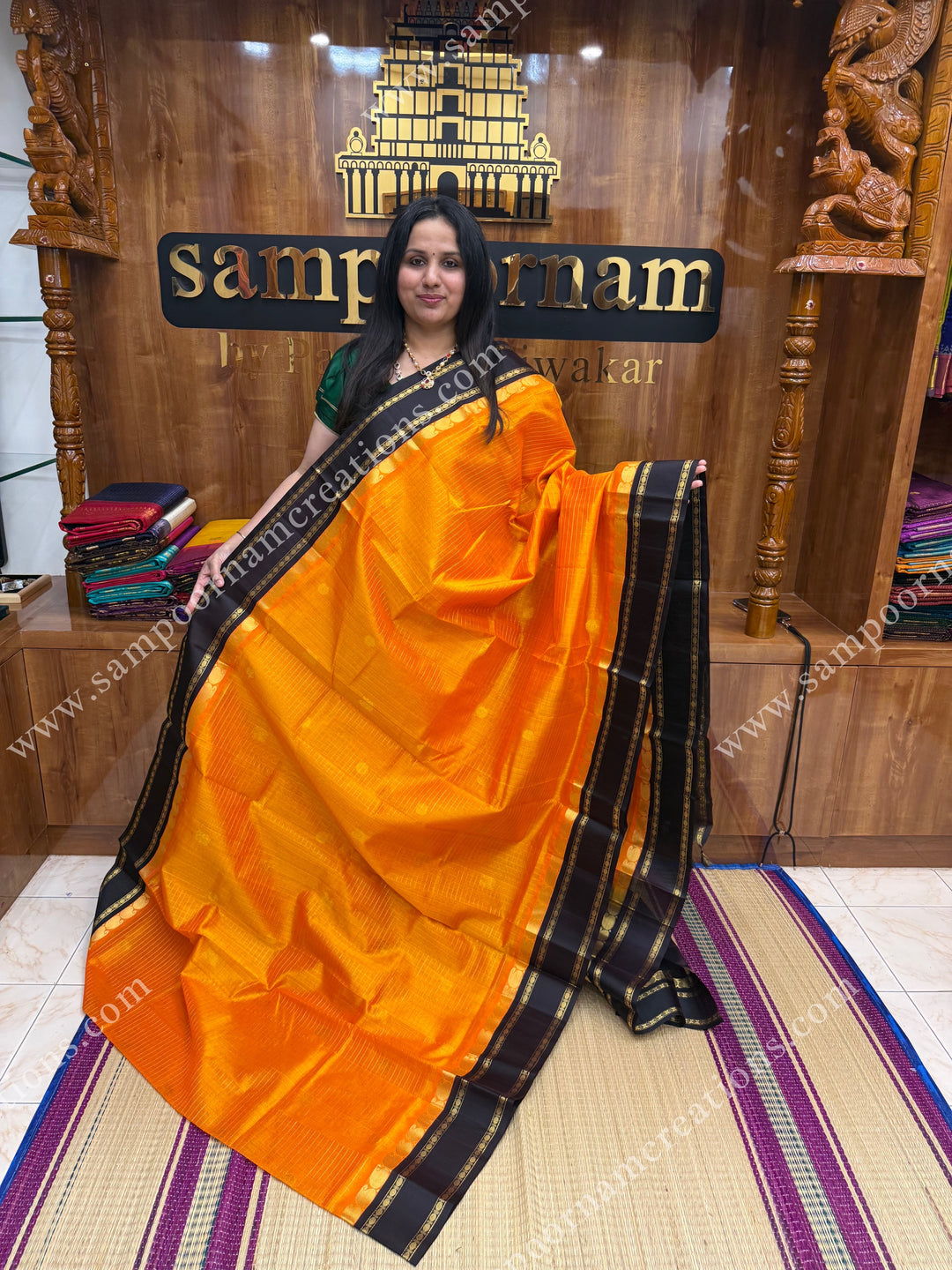 Mambazha Manjal with Deep Brown , Zari checks and Annam butta in the body  ,  Rettapetborders and rich Pallu Korvai Silk Cotton Sareee