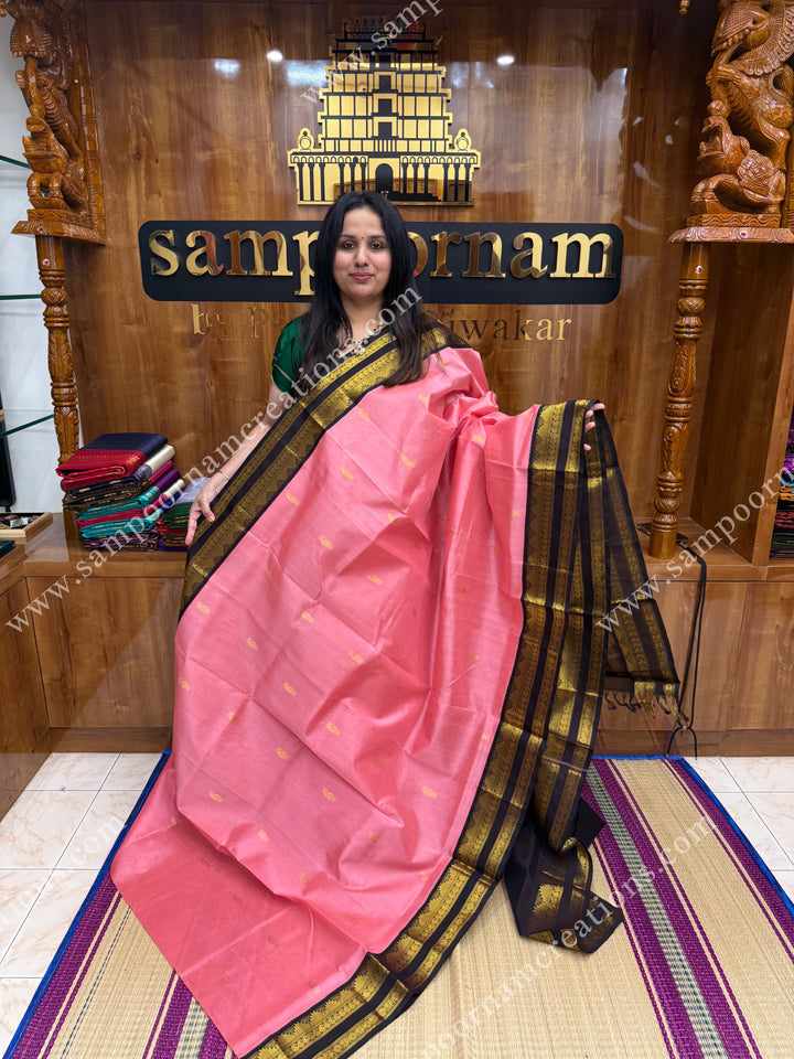 Rouge Pink with Dark Brown , Rich Mango Zari butta in the body and Rettapet borders , rich Pallu Korvai Silk Cotton Sareee