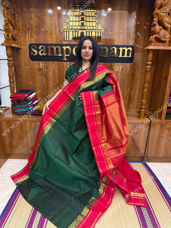 Green with Red  , Rich Zari checks in the body and  rettapet  borders , rich Pallu Korvai Silk Cotton Sareee
