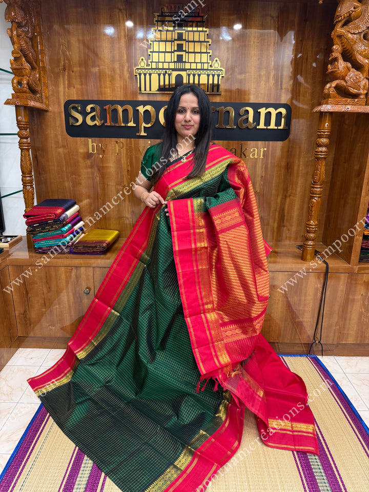 Green with Red  , Rich Zari checks in the body and  rettapet  borders , rich Pallu Korvai Silk Cotton Sareee