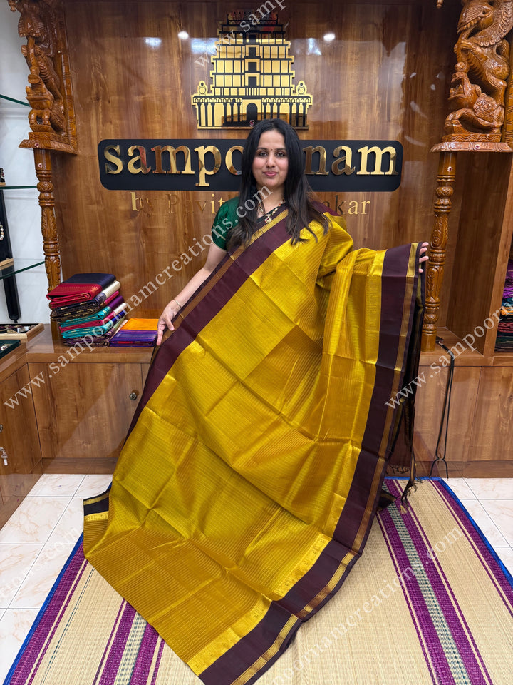 Dark Gold with Brown  , Rich Zari checks in the body and  rettapet  borders , rich Pallu Korvai Silk Cotton Sareee