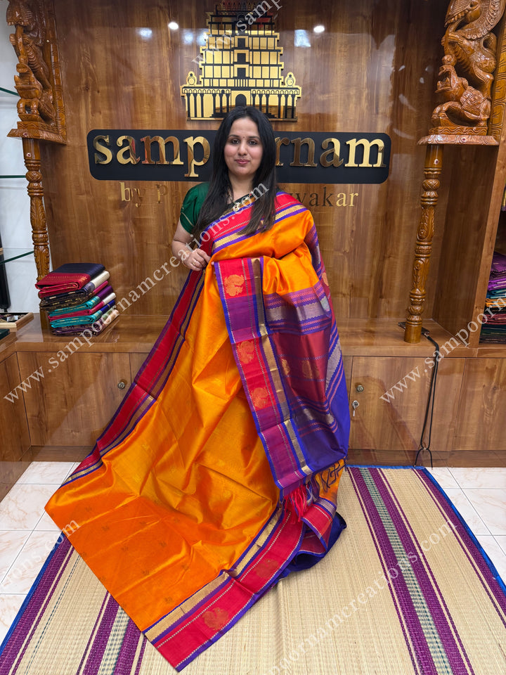 Mambazha Manjal with Royal Blue ,  Zari Butta in the body and  Traditional Annam Motifs in the border , rich Pallu Korvai Silk Cotton Sareee