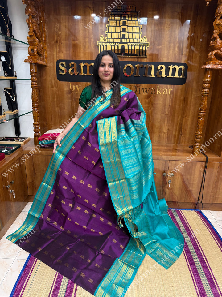 Vadamalli with Turquoise Blue , Rich Zari butta in the body and Traditional Kanchi borders , rich Pallu Korvai Silk Cotton Sareee