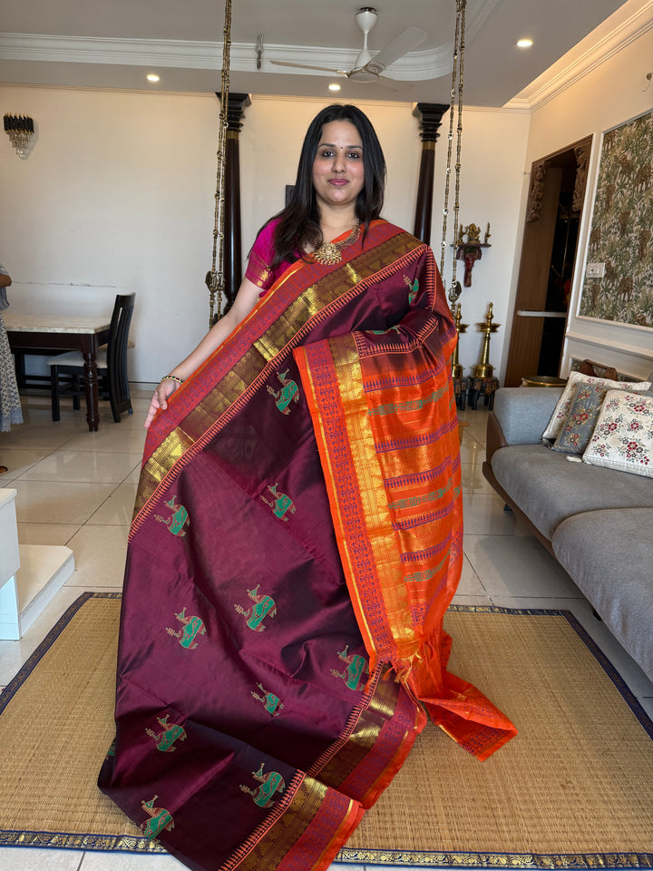 Maroon with orange , terracotta horse hand block printed silk cotton saree