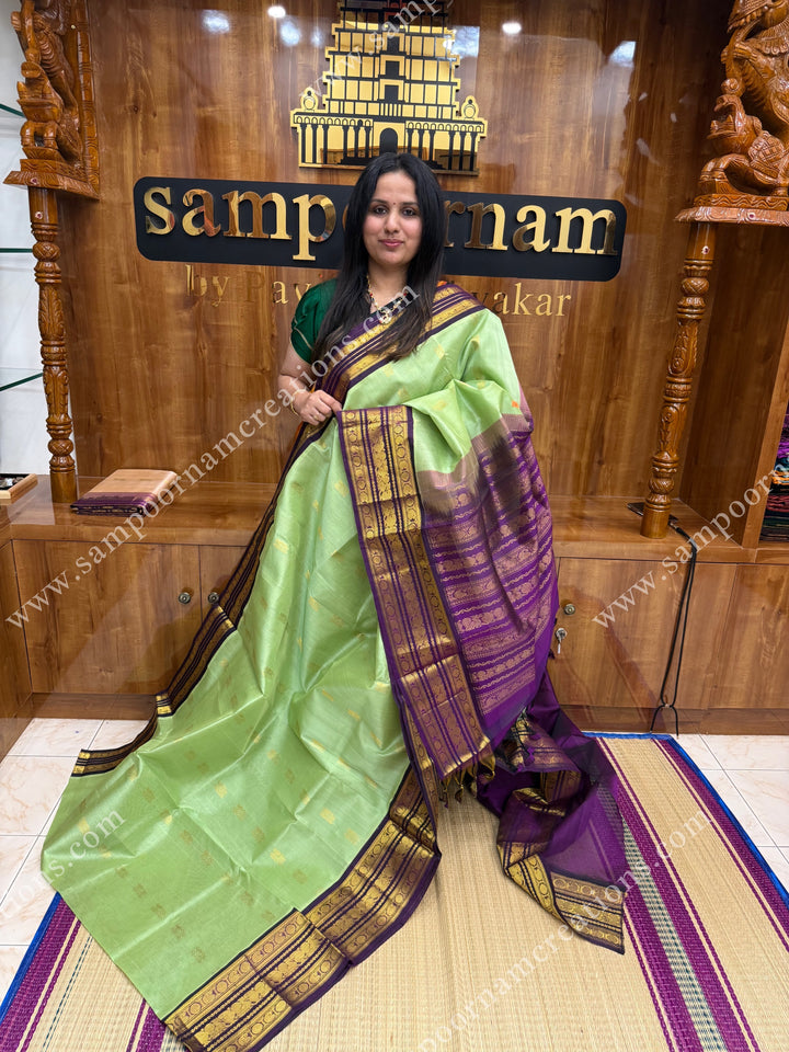 Pastel Pista Green with Vadamalli , Rich Zari butta in the body and Traditional Kanchi borders , rich Pallu Korvai Silk Cotton Sareee