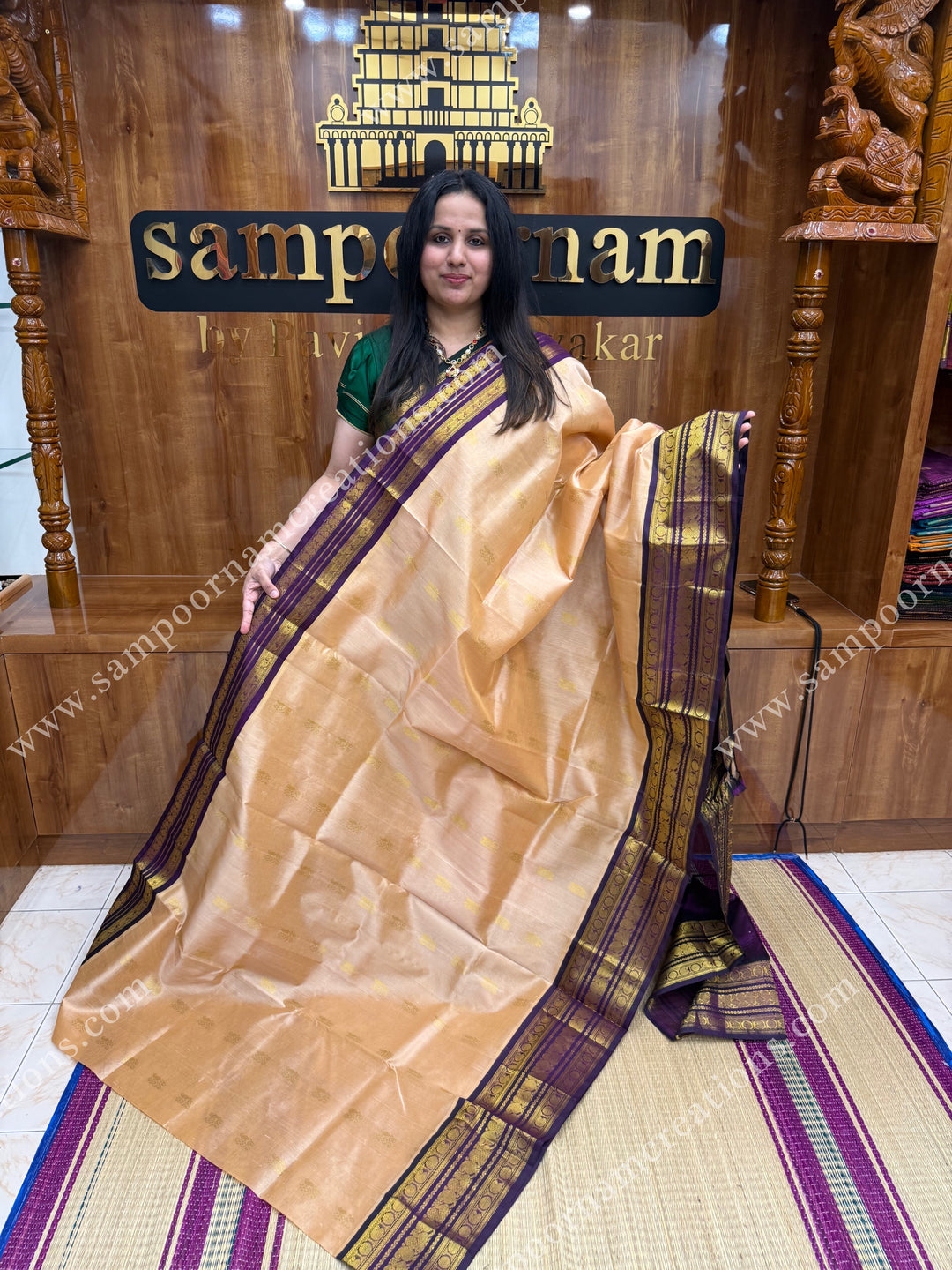 Biscuit with Purple , Rich Zari butta in the body and Traditional Kanchi borders , rich Pallu Korvai Silk Cotton Sareee