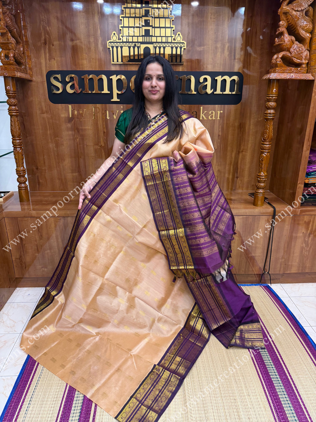 Biscuit with Purple , Rich Zari butta in the body and Traditional Kanchi borders , rich Pallu Korvai Silk Cotton Sareee