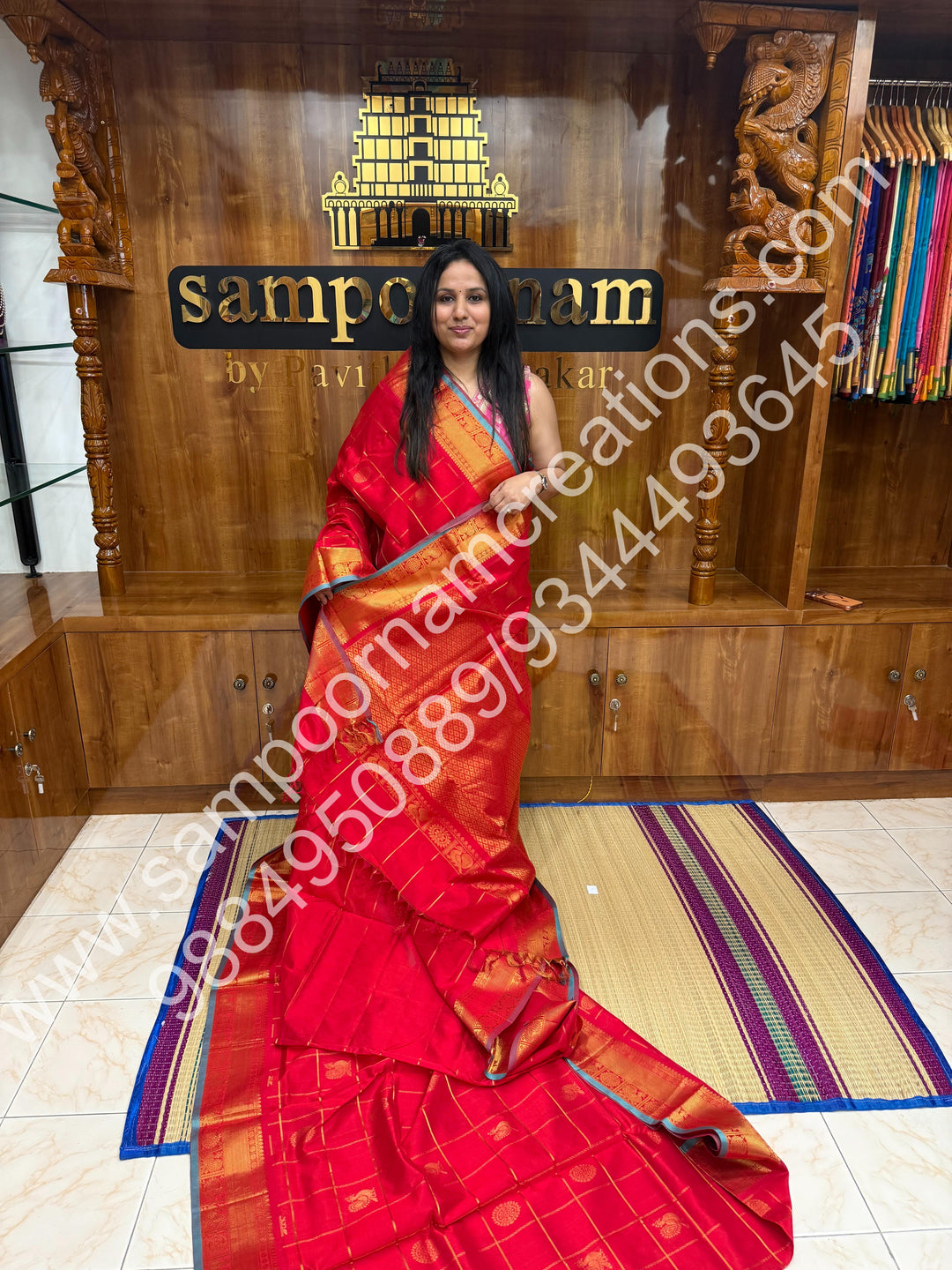 Red with Blue Selvedge , rich zari checks in the body , with mayil and chakram butta , 10 yards silk cotton saree