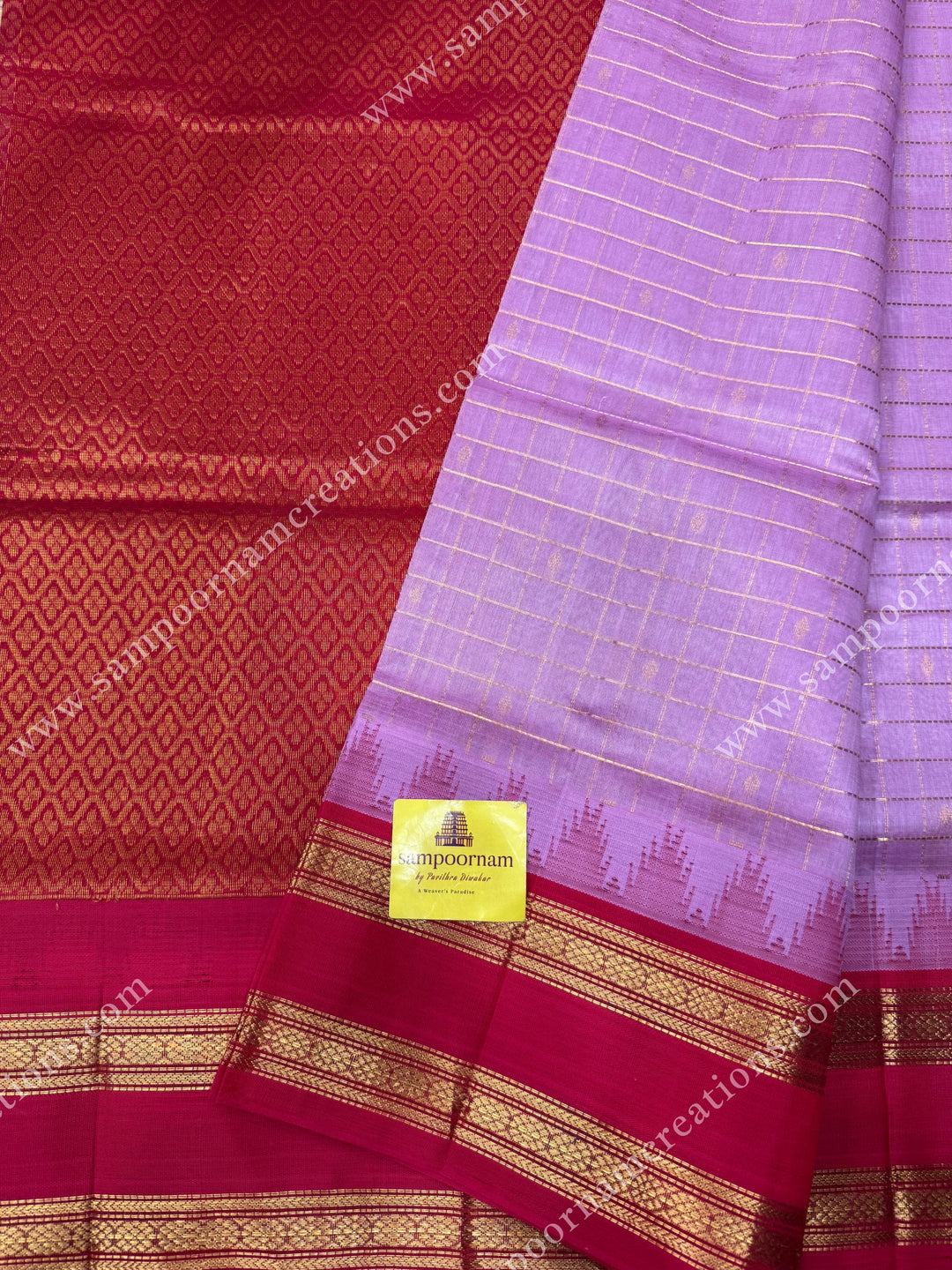 Pastel Pink with Red , Rich Zari checks and Butta in the body and  rettapet  borders , rich Pallu Korvai Silk Cotton Sareee