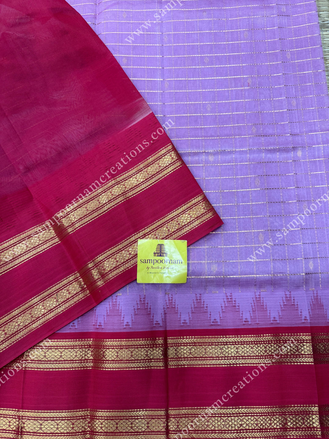 Pastel Pink with Red , Rich Zari checks and Butta in the body and  rettapet  borders , rich Pallu Korvai Silk Cotton Sareee