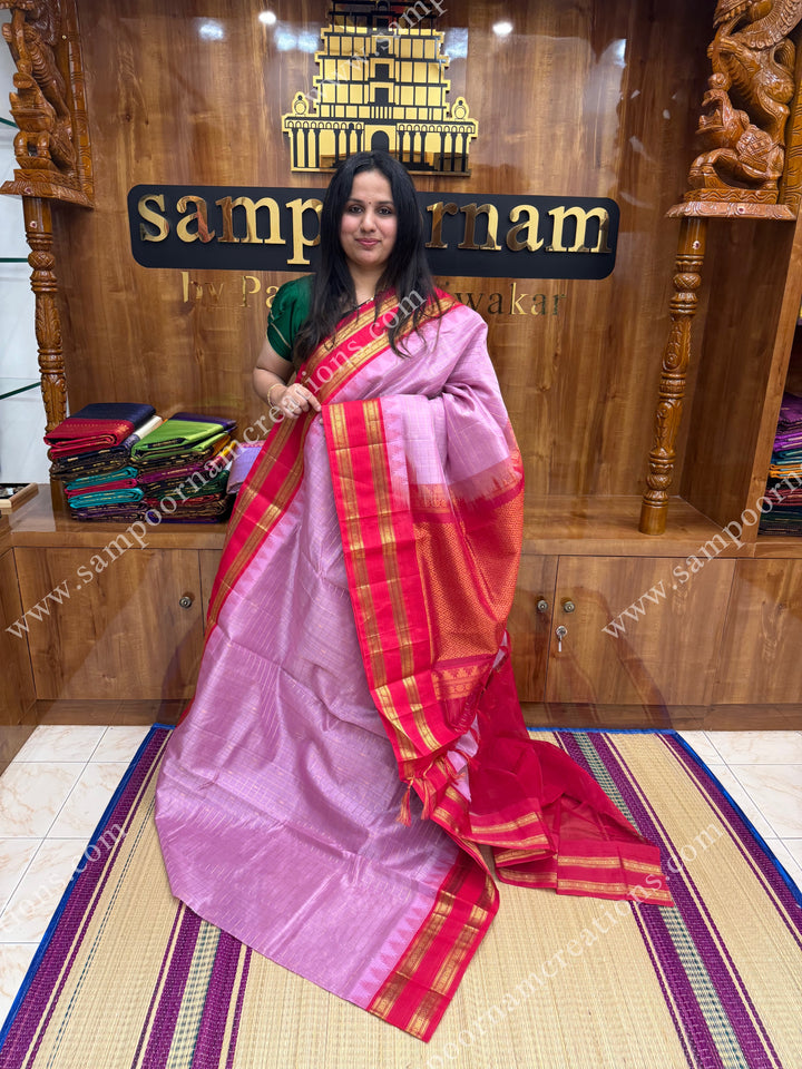 Pastel Pink with Red , Rich Zari checks and Butta in the body and  rettapet  borders , rich Pallu Korvai Silk Cotton Sareee