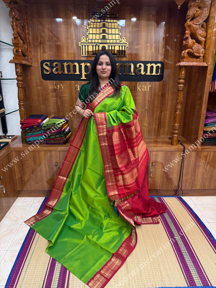 Parrot Green with Dark Red ,  Traditional borders and rich Pallu Korvai Silk Cotton Sareee