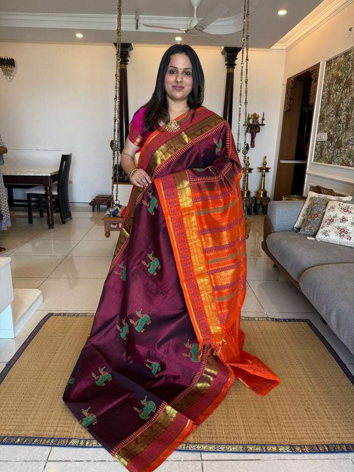 Maroon with orange , terracotta horse hand block printed silk cotton saree