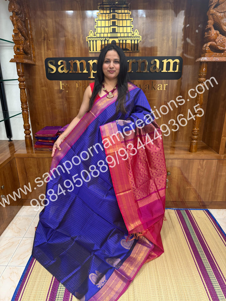 Blue with Magenta  Annam motif , zari buttu in the borders , zari checks in the body and rich Pallu Silk Cotton Saree