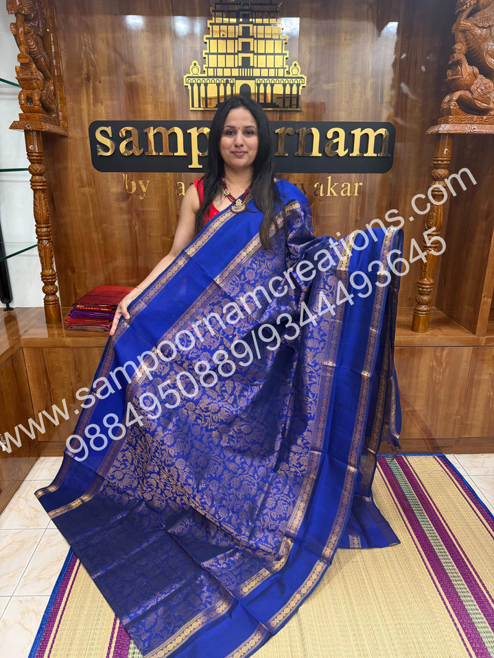 Royal blue ,  rich Vanasingaram Designs in the body , rettapet borders and rich pallu silk cotton saree