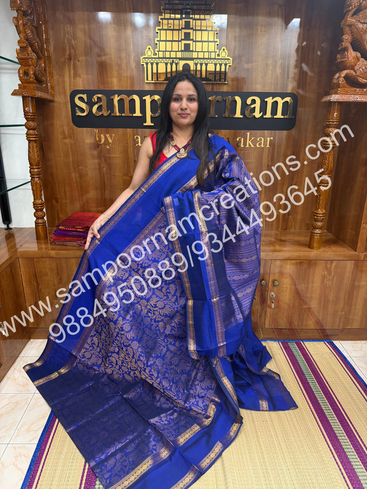 Royal blue ,  rich Vanasingaram Designs in the body , rettapet borders and rich pallu silk cotton saree