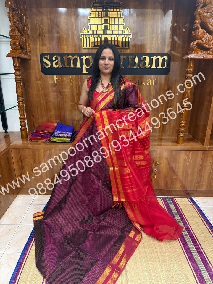 Wine with Red , rich Zari checks in the body and border ,rettapet borders  rich Pallu Silk Cotton Saree