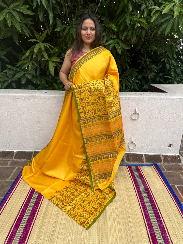 Mustard Yellow Pichwai Cow Handblock Printed Tussar Silk Saree, with contrast handblock printed bloucs