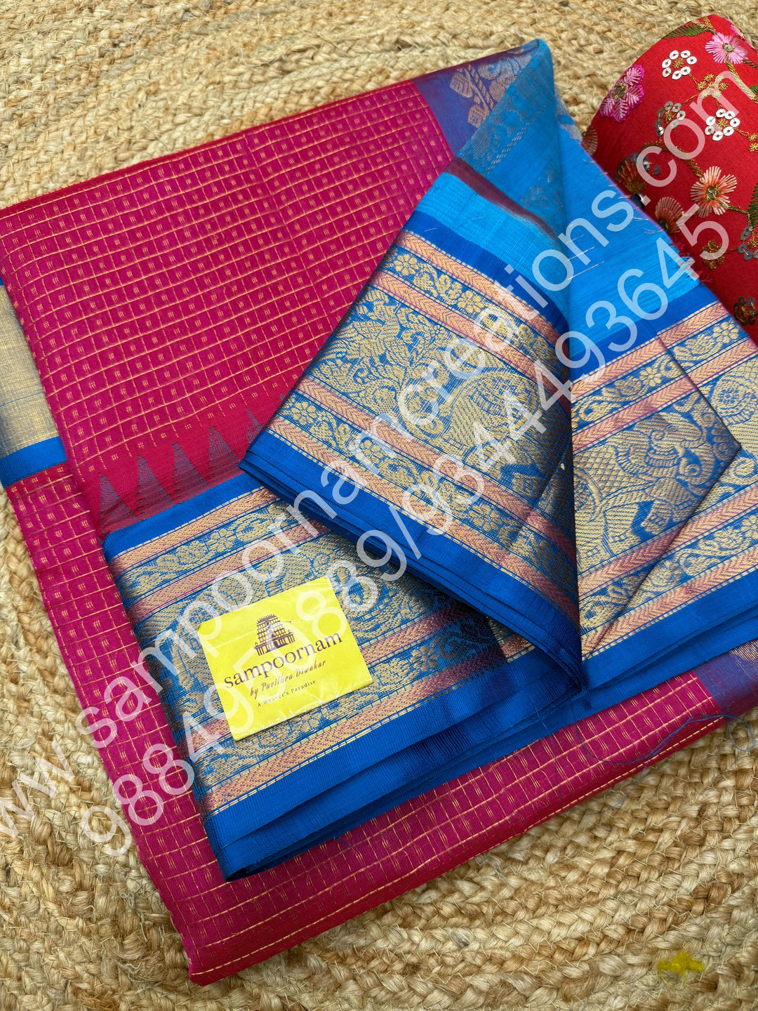 Hot Pink with Ramar Blue , rich traditional borders and Lakshadeepam Zari Buttas all over the body and Grand Pallu Korvai Silk Cotton Saree