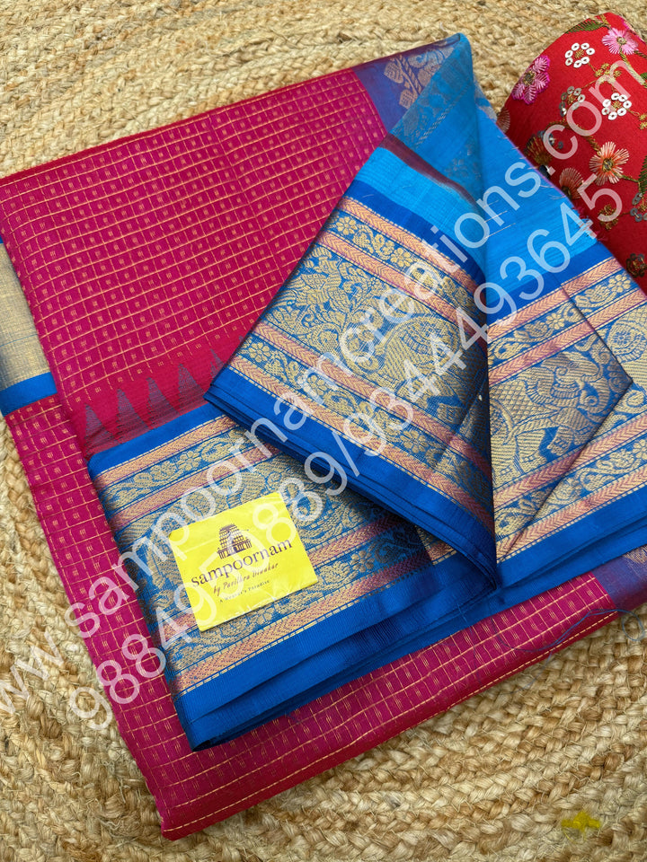 Hot Pink with Ramar Blue , rich traditional borders and Lakshadeepam Zari Buttas all over the body and Grand Pallu Korvai Silk Cotton Saree