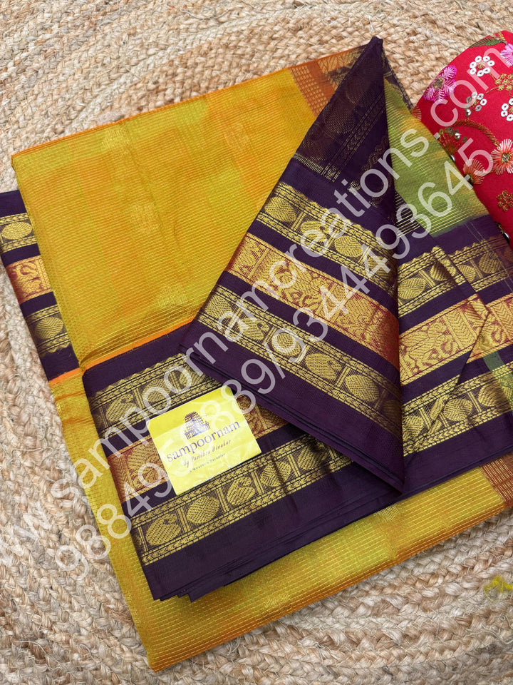 Maanthulir with Arakku , rich Zari Podi Kattam with Mango butta in the body , traditional Kanchi border and rich Pallu Korvai Silk Cotton Saree